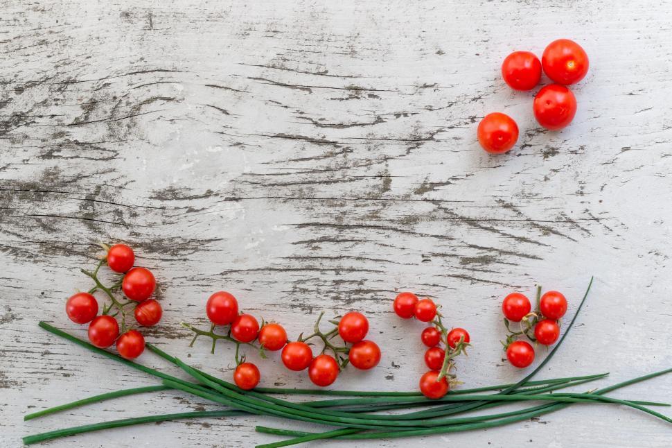 Free Image of Red Berries on Wooden Table 