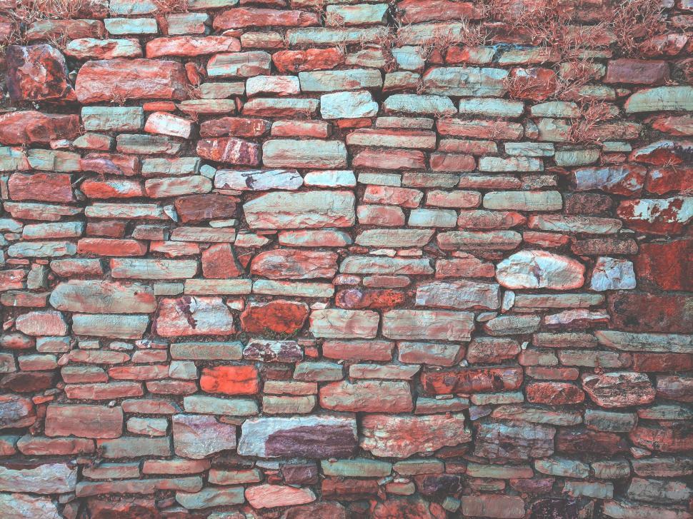 Free Image of Red and Blue Bricks Forming a Wall 
