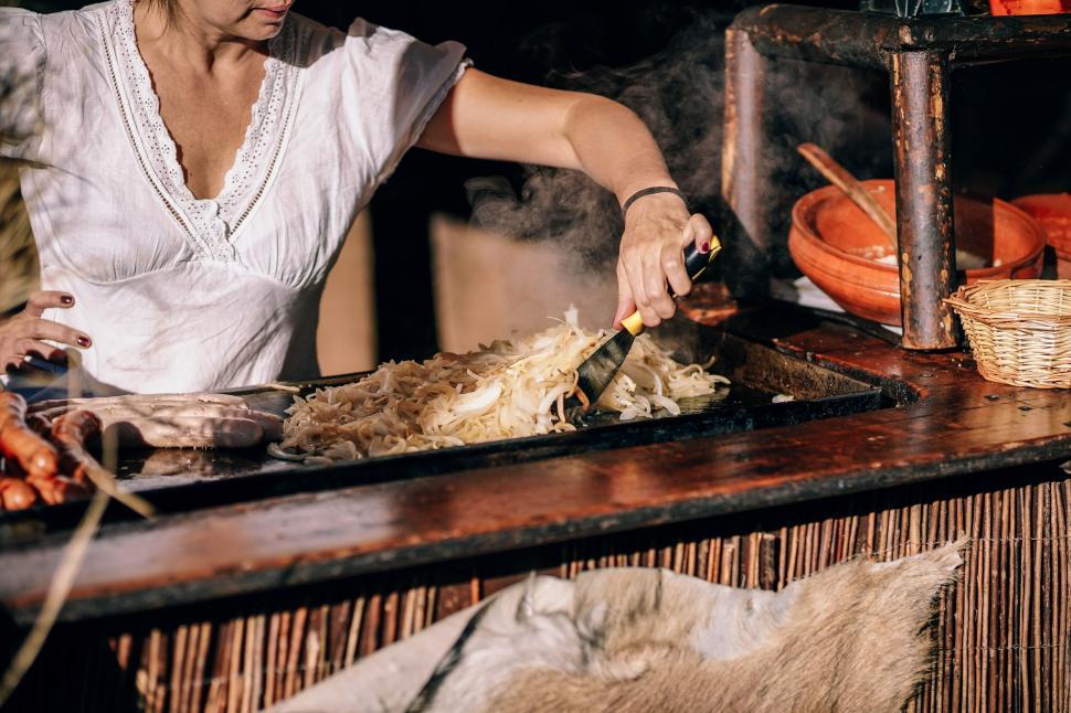 Free Image of Woman Cooking Food on Grill 