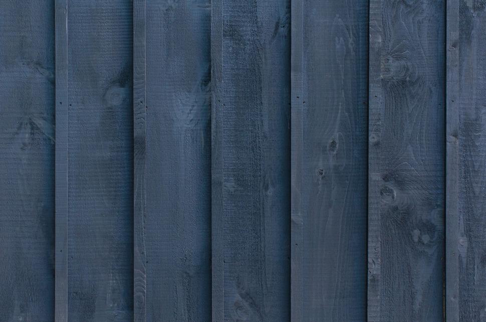 Free Image of Dark Blue Wooden Wall With Vertical Planks 