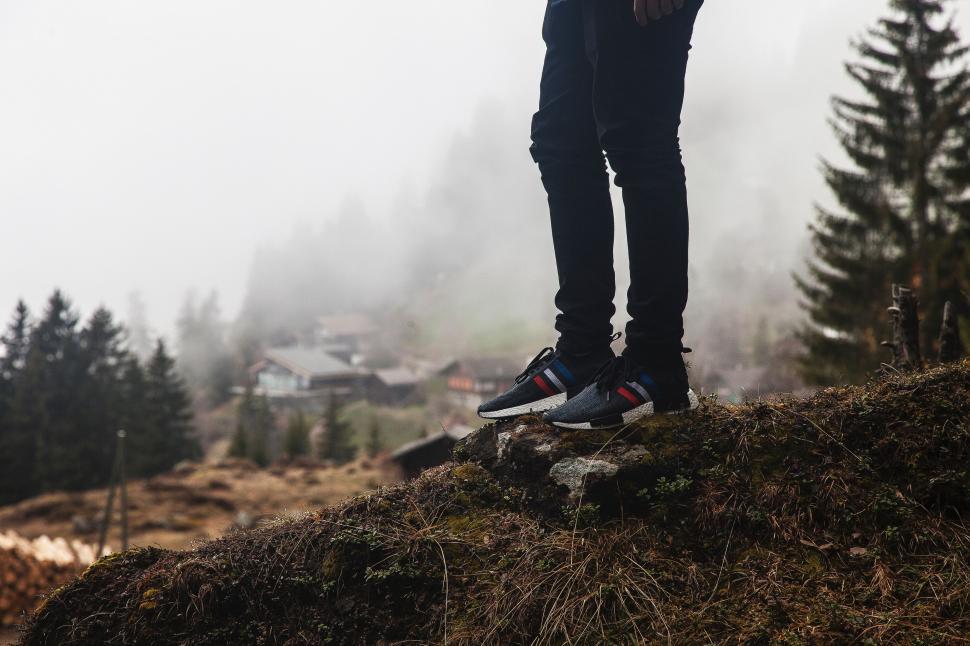 Free Image of Person Standing on Top of a Hill 