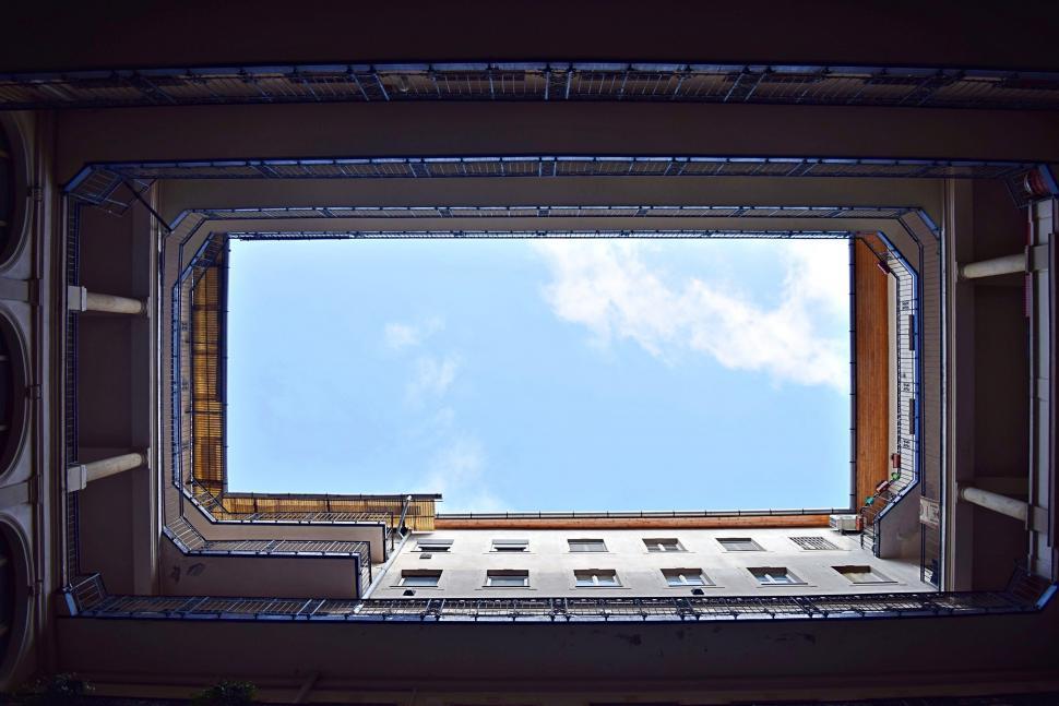 Free Image of Observing the Sky Through a Window 