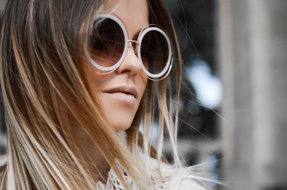 Free Image of Woman in Round Sunglasses and Fur Coat 