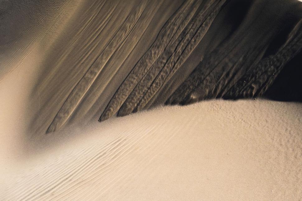 Free Image of Majestic Sand Dunes Stretching Across the Landscape 