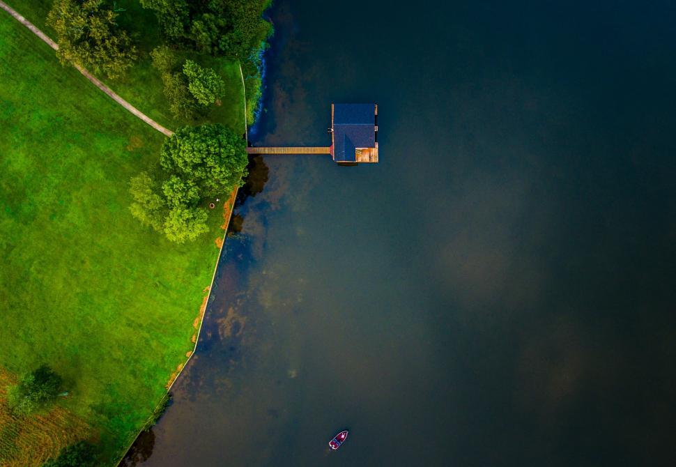 Free Image of Aerial View of House on Lake 