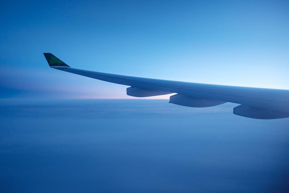 Free Image of A View of the Wing of an Airplane in the Sky 