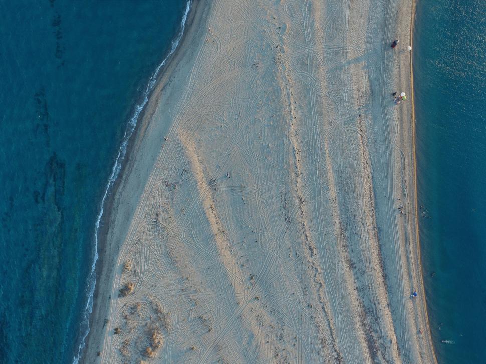 Free Image of Aerial View of Sandy Beach and Ocean 
