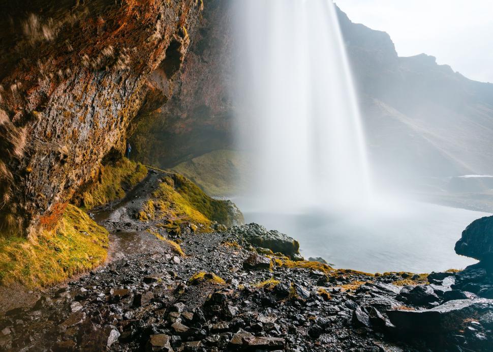 Free Image of Waterfall Cascading From Cliff Face 