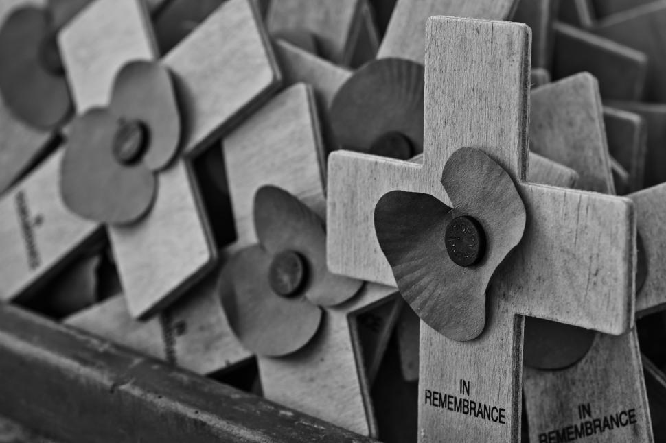 Free Image of Group of Wooden Crosses With Flowers 