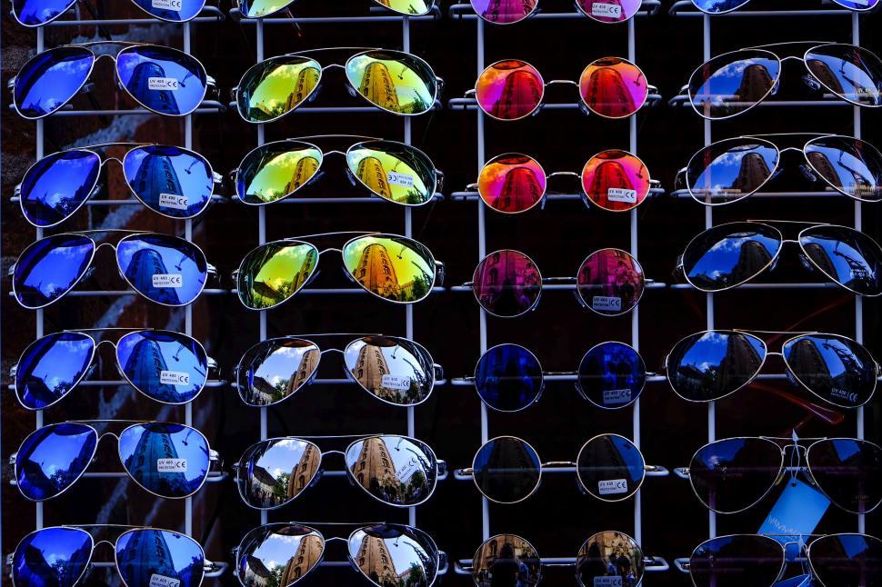 Free Image of Many Pairs of Sunglasses on Display Rack 