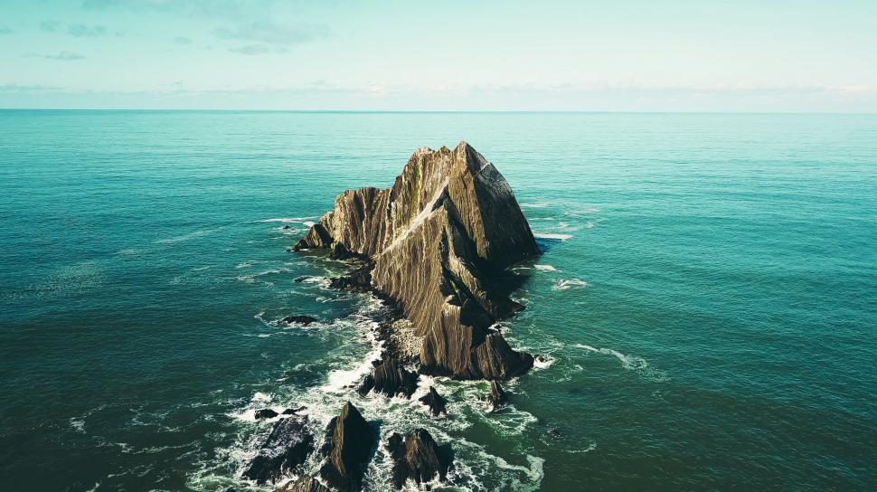 Free Image of Rock Outcropping in Middle of Ocean 