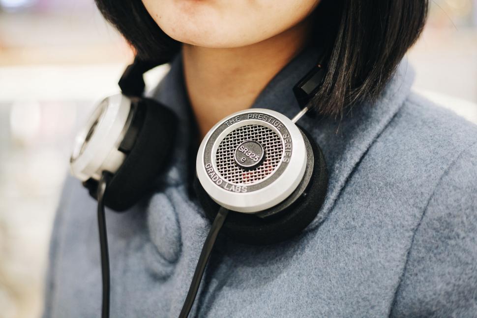 Free Image of Person Wearing Headphones Listening to Music Close Up 