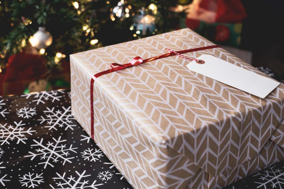 Free Image of Gift Wrapped in Brown Paper With Red Ribbon 