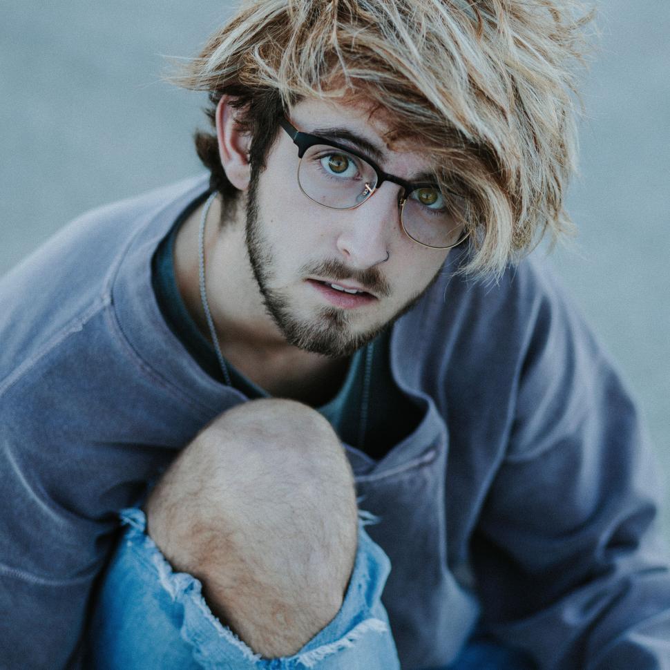 Free Image of Man With Glasses and Messy Haircut 