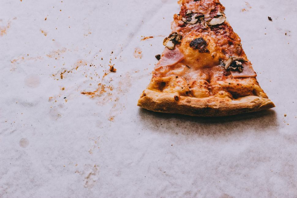 Free Image of Slice of Pizza on Table 
