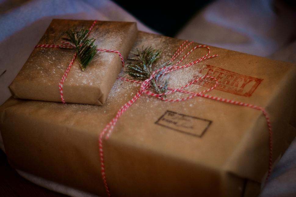 Free Image of Two Wrapped Presents in Brown Paper With Twine 