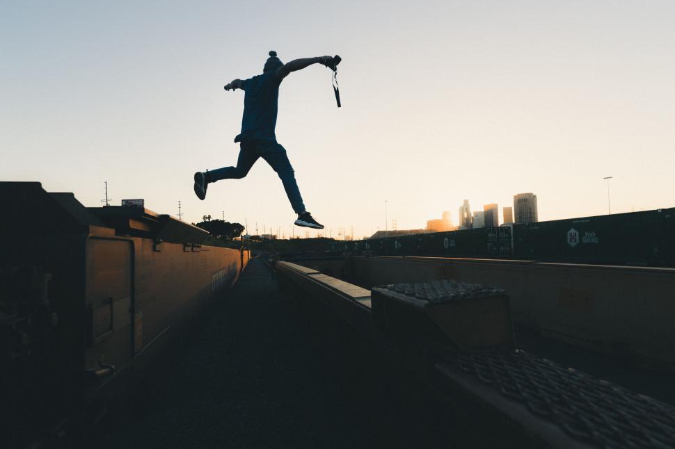 Free Image of Person Jumping in the Air on a Skateboard 