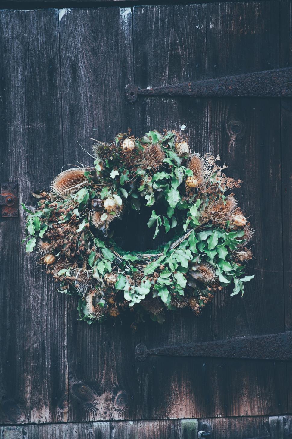 Free Image of Wreath Hanging on Wooden Door 