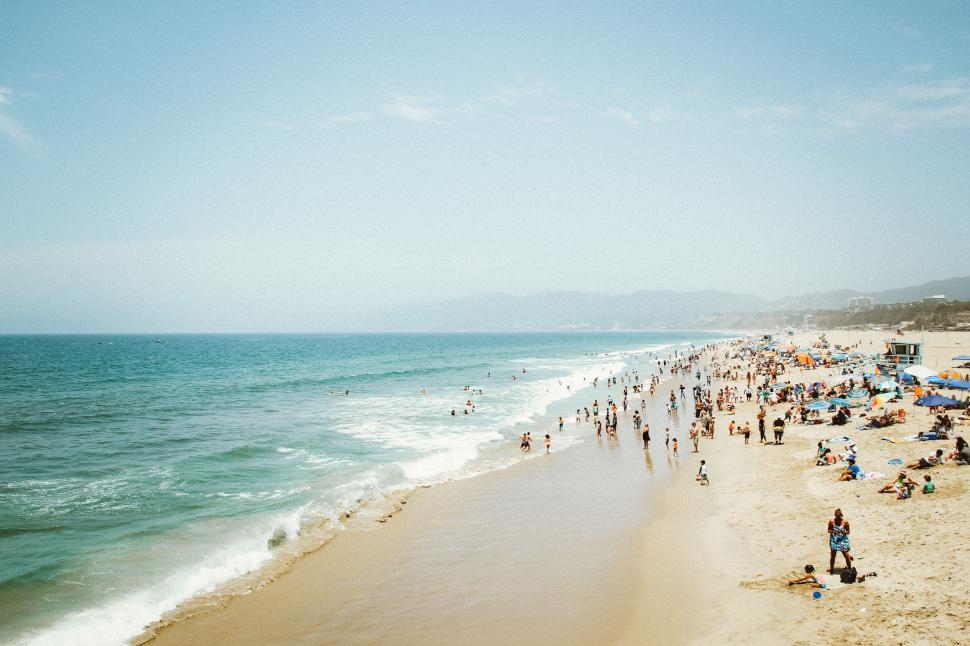Free Image of A Crowded Beach Scene 
