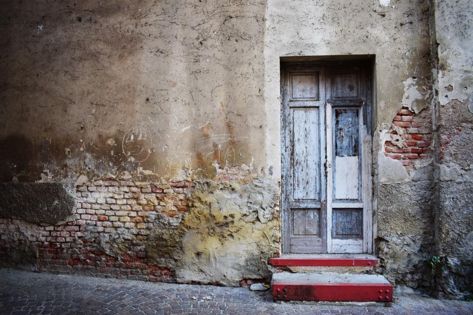 Free Image of Old Building With Door and Steps 