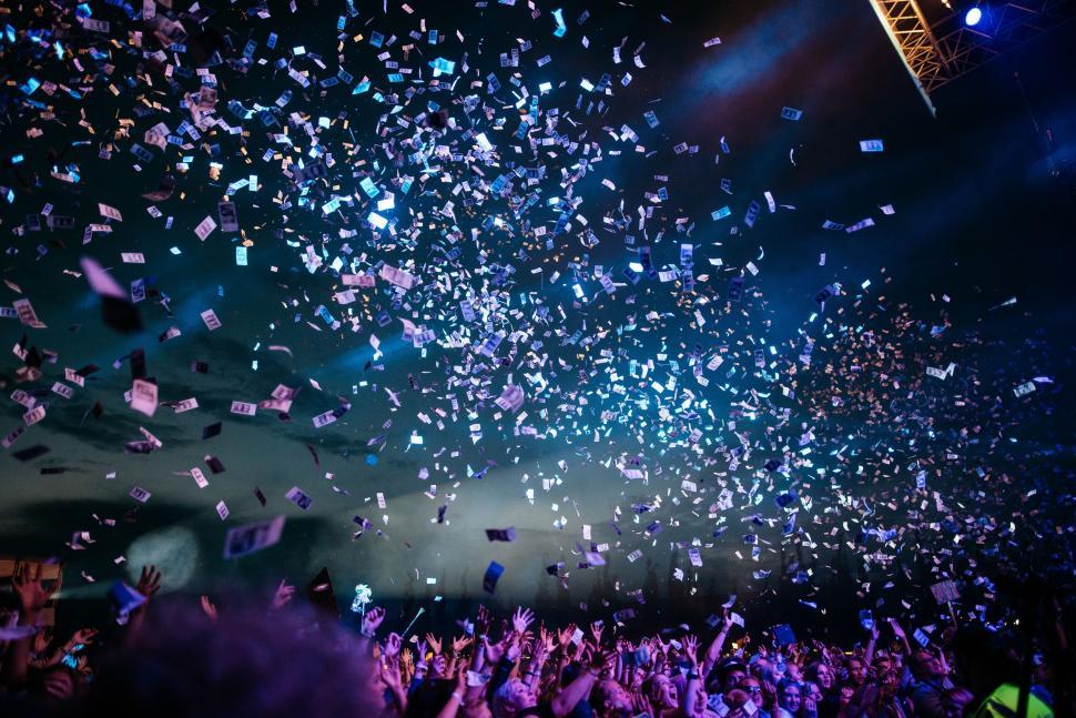 Free Image of Energetic Crowd at Concert With Confetti 
