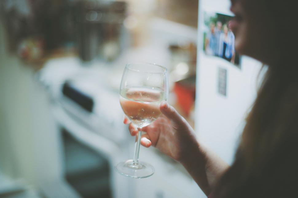 Free Image of Woman Holding a Wine Glass 