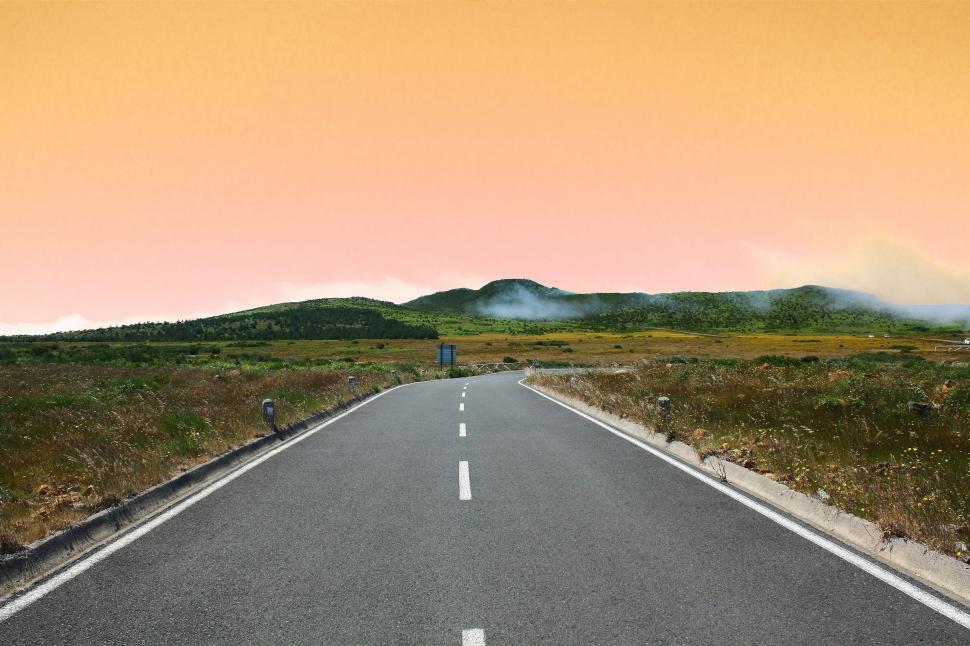 Free Image of Empty Road With Yellow Sky 