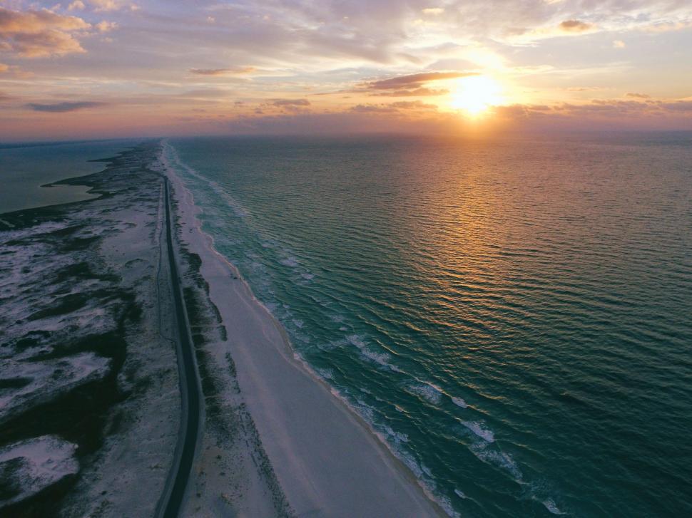 Free Image of Aerial View of Beach at Sunset 