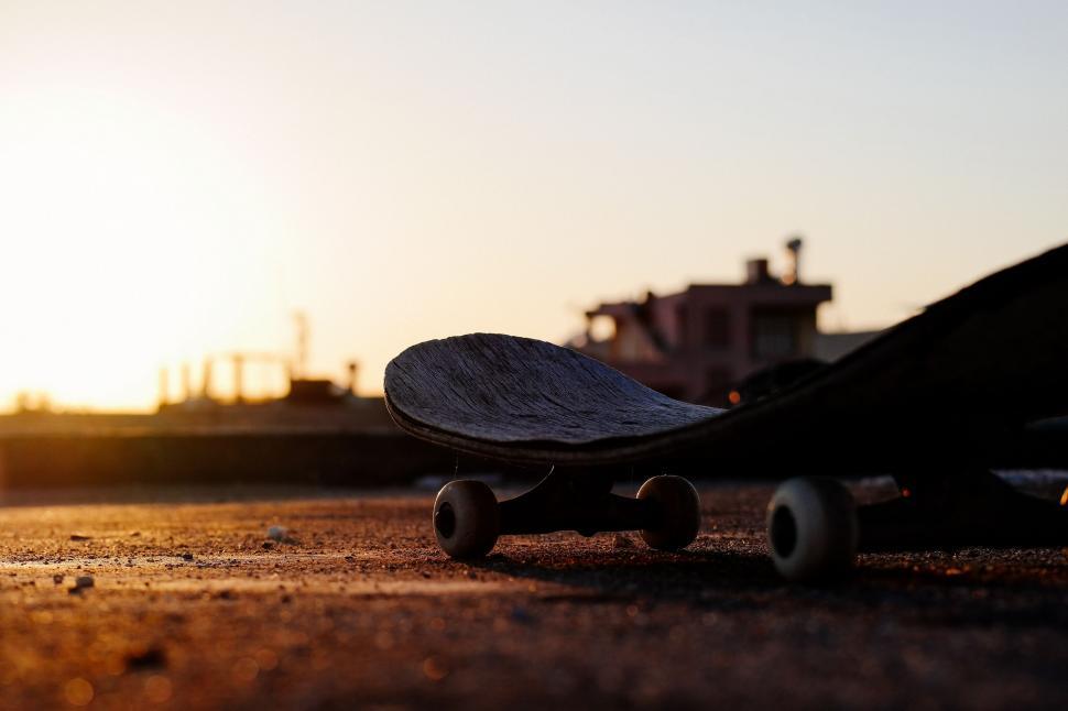Free Image of Skateboard Leaning Against Building 