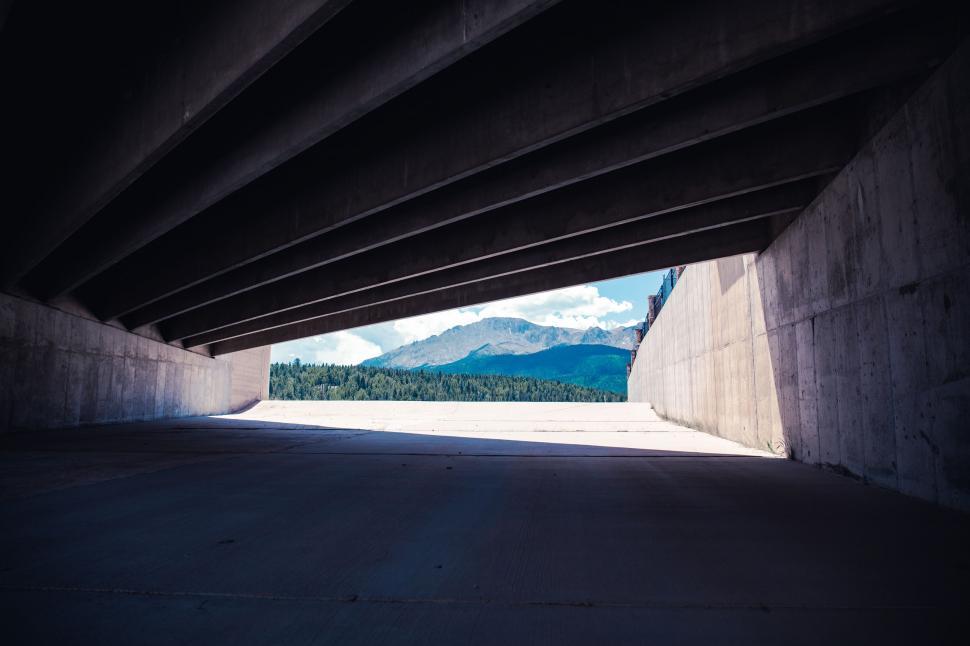 Free Image of Dark Tunnel With Distant Mountains 