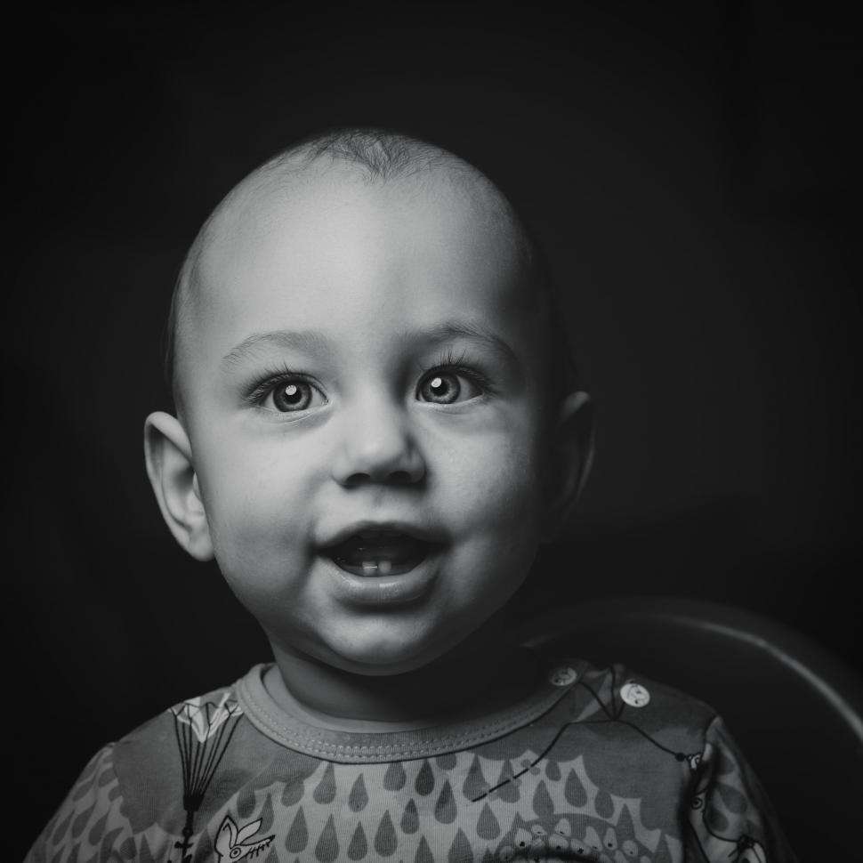 Free Image of Baby Sitting in Chair 