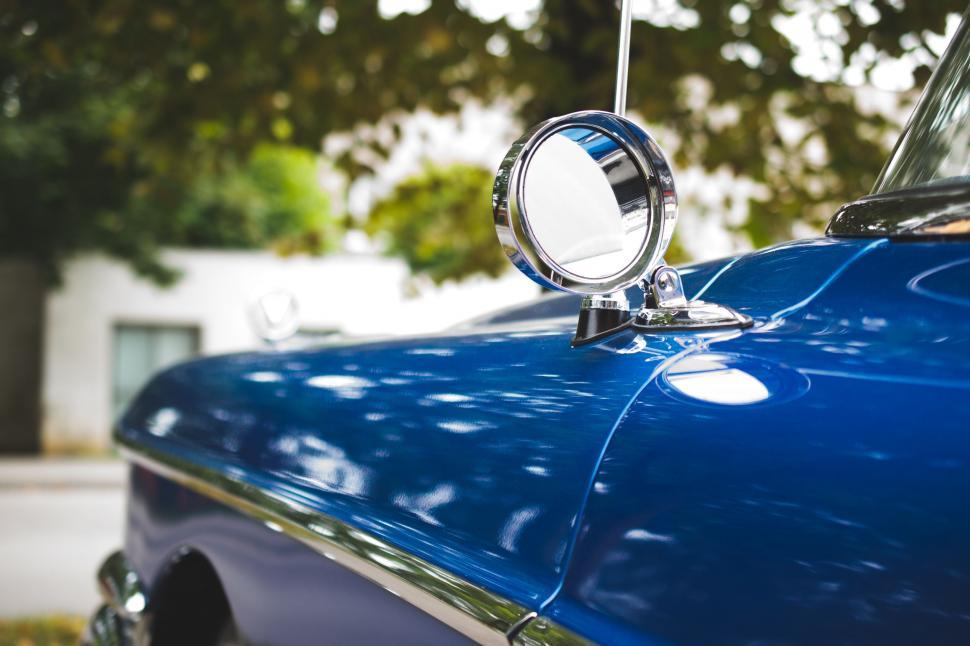 Free Image of Close Up of Blue Car With Side Mirror 