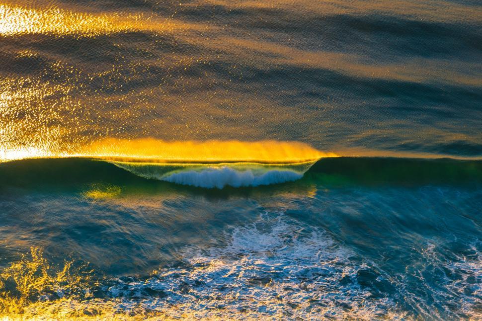 Free Image of Sun Shining on Ocean Wave 