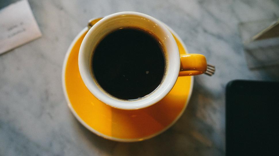 Free Image of A Cup of Coffee on a Table 