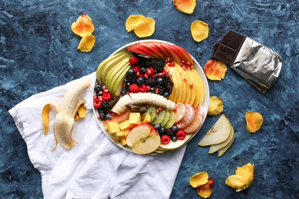 Free Image of Bowl of Fruit With Chocolate Bar 