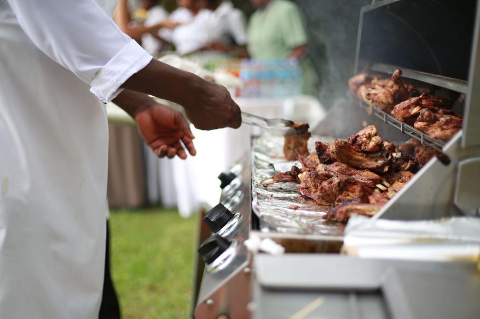 Free Image of Person Cooking Food on Grill 