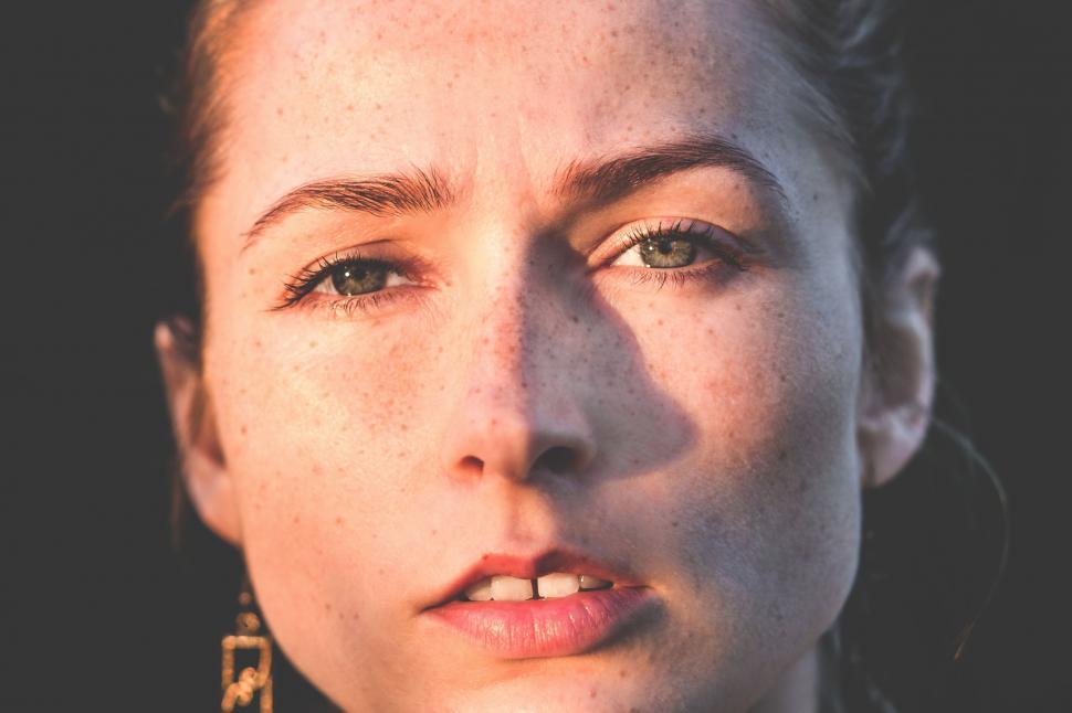 Free Image of Close-Up Portrait of a Person With Freckles on Their Face 