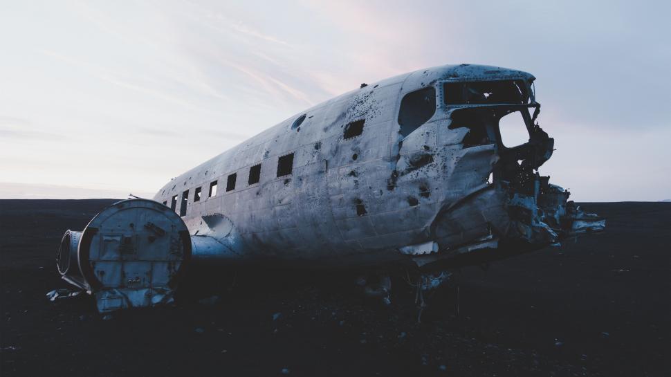 Free Image of Old Airplane Resting in Field 
