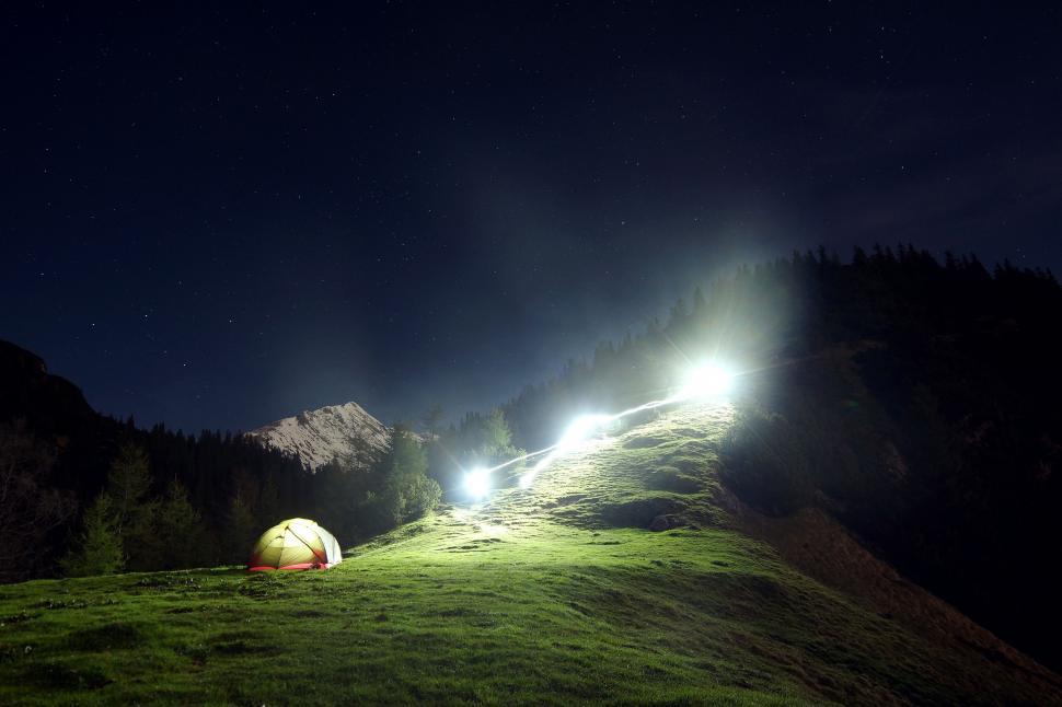 Free Image of Tent Pitched on a Grassy Field 