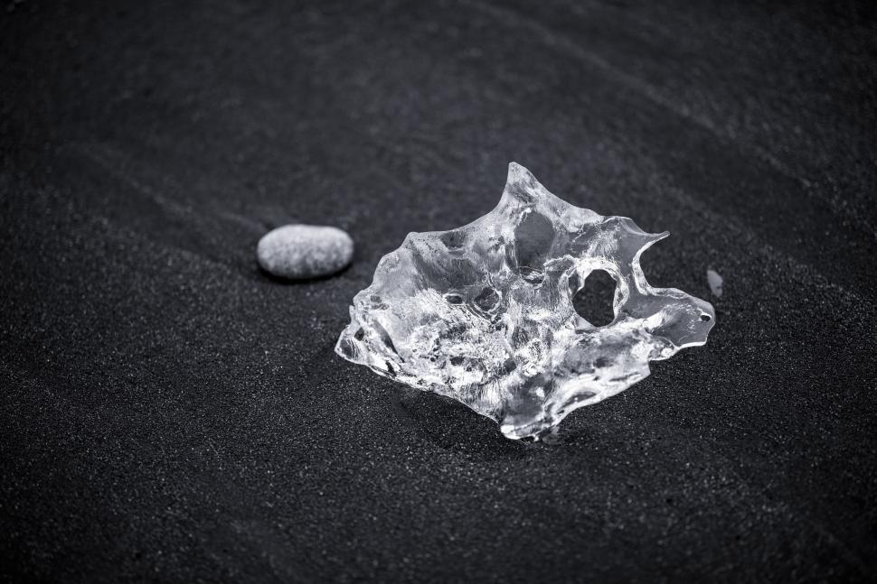 Free Image of Ice Piece on Black Surface 