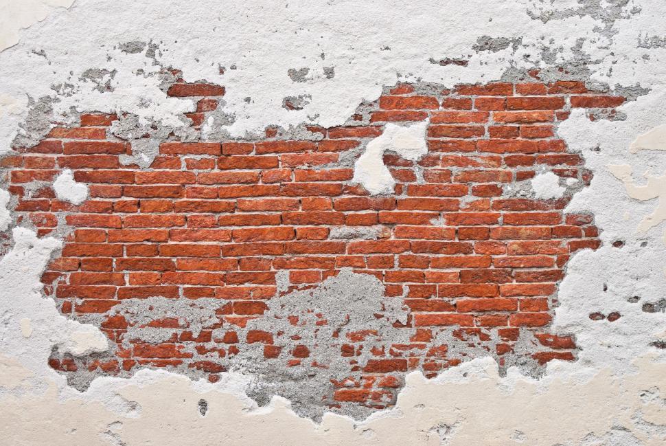 Free Image of Peeling White Paint on Red Brick Wall 