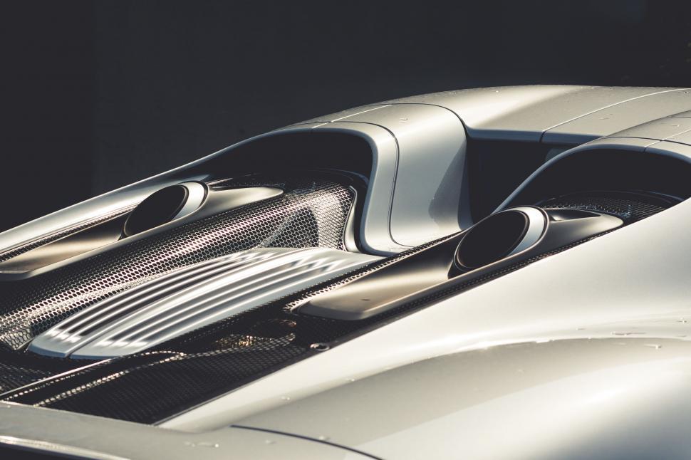 Free Image of Close Up of a Silver Sports Car 