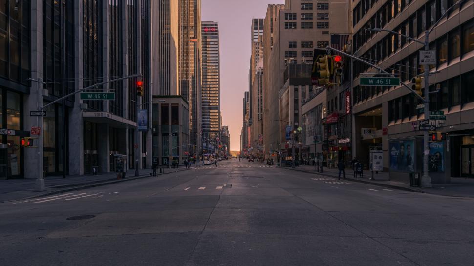 Free Image of Deserted City Street With Tall Buildings 