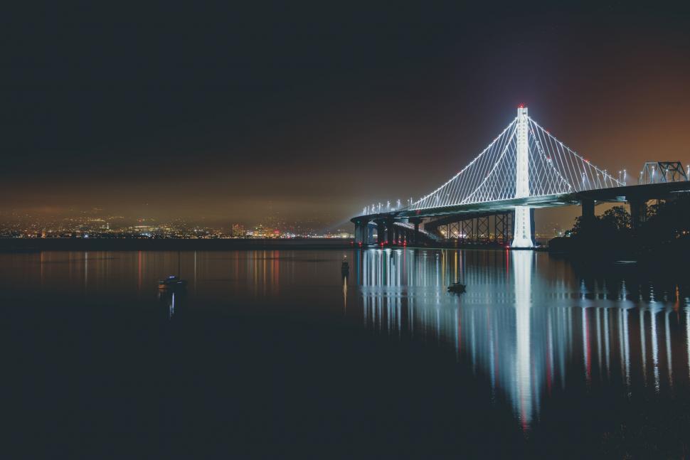 Free Image of Large Bridge Spanning Across Vast Waterway 