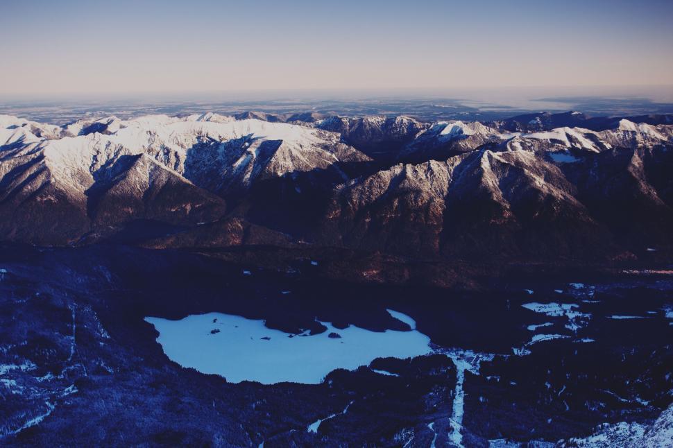 Free Image of Aerial View of Snow-Covered Mountains and Lakes 