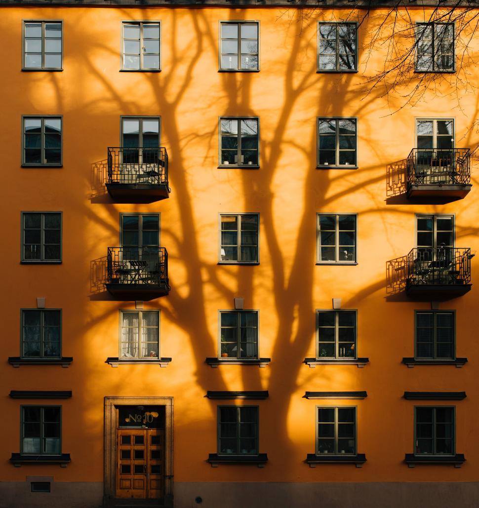 Free Image of Yellow Building With Balconies 