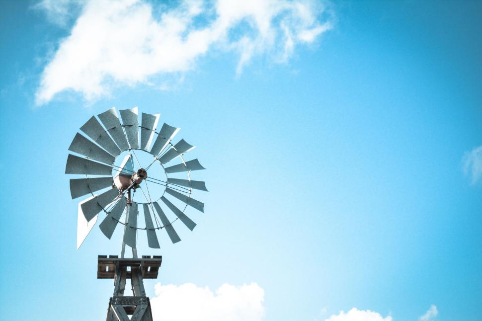 Free Image of Windmill Perched on Metal Pole 