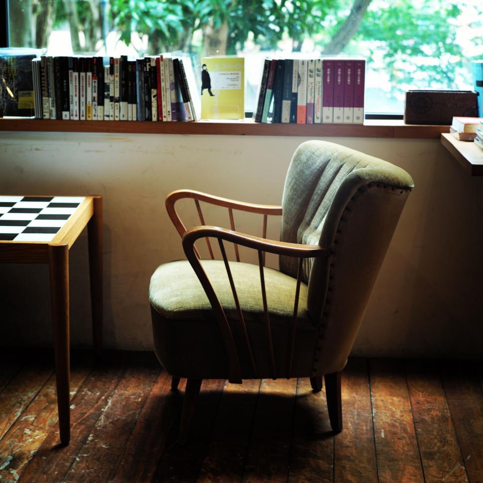 Free Image of Chair by Window Next to Table 