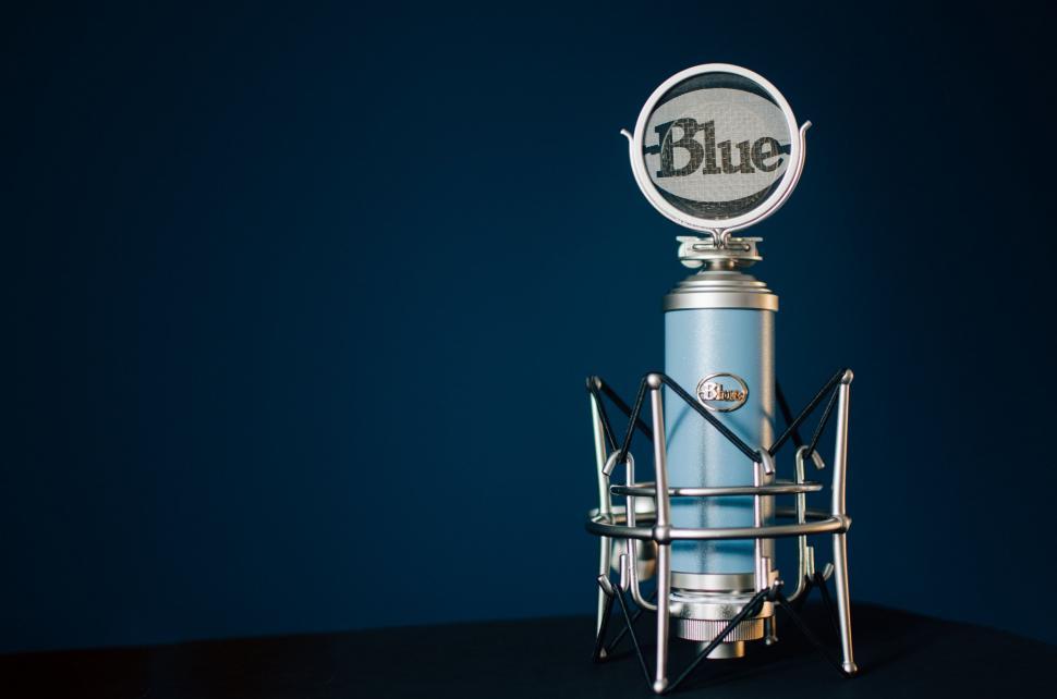 Free Image of Blue Microphone With the Word Blue 