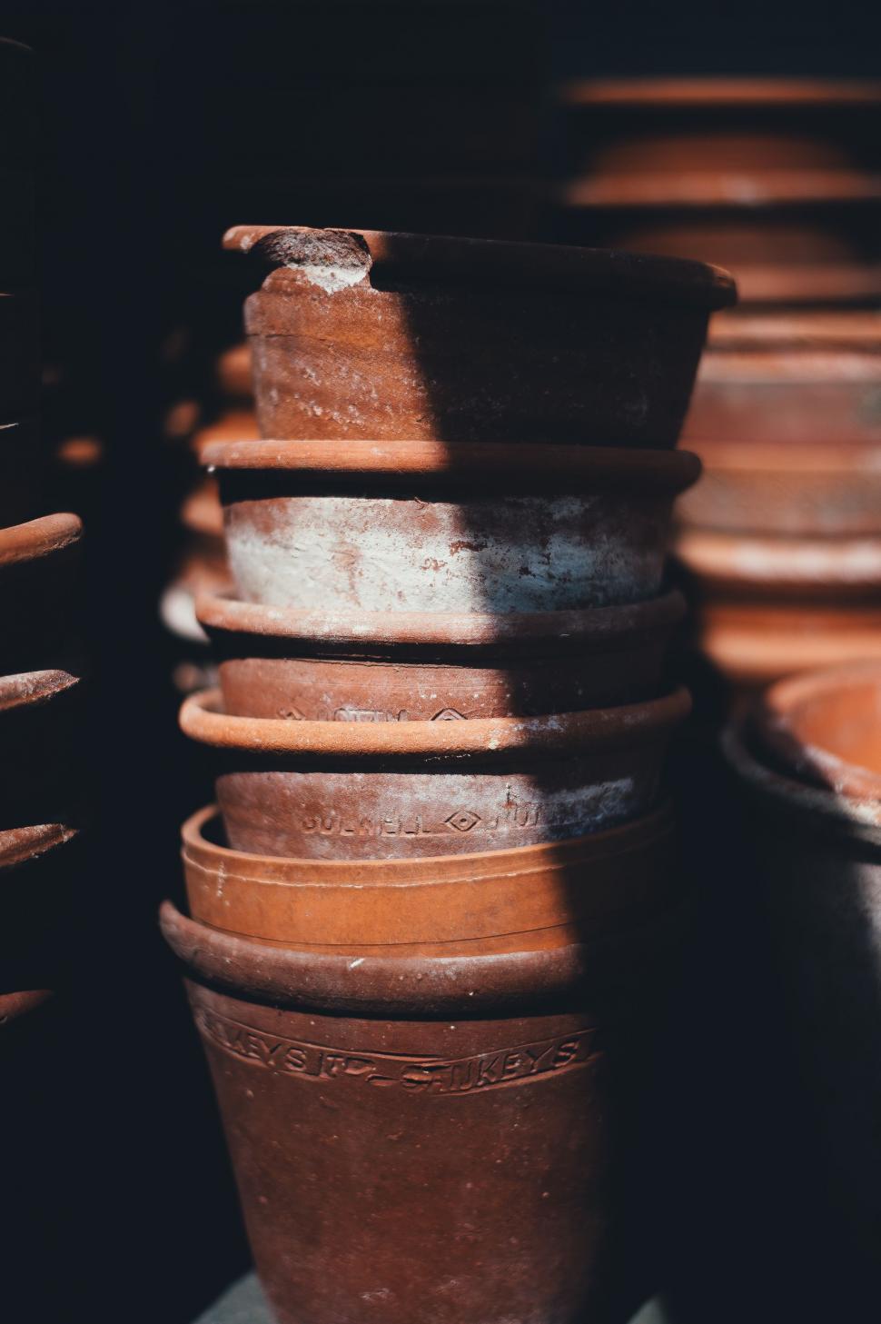 Free Image of A Stack of Clay Pots 